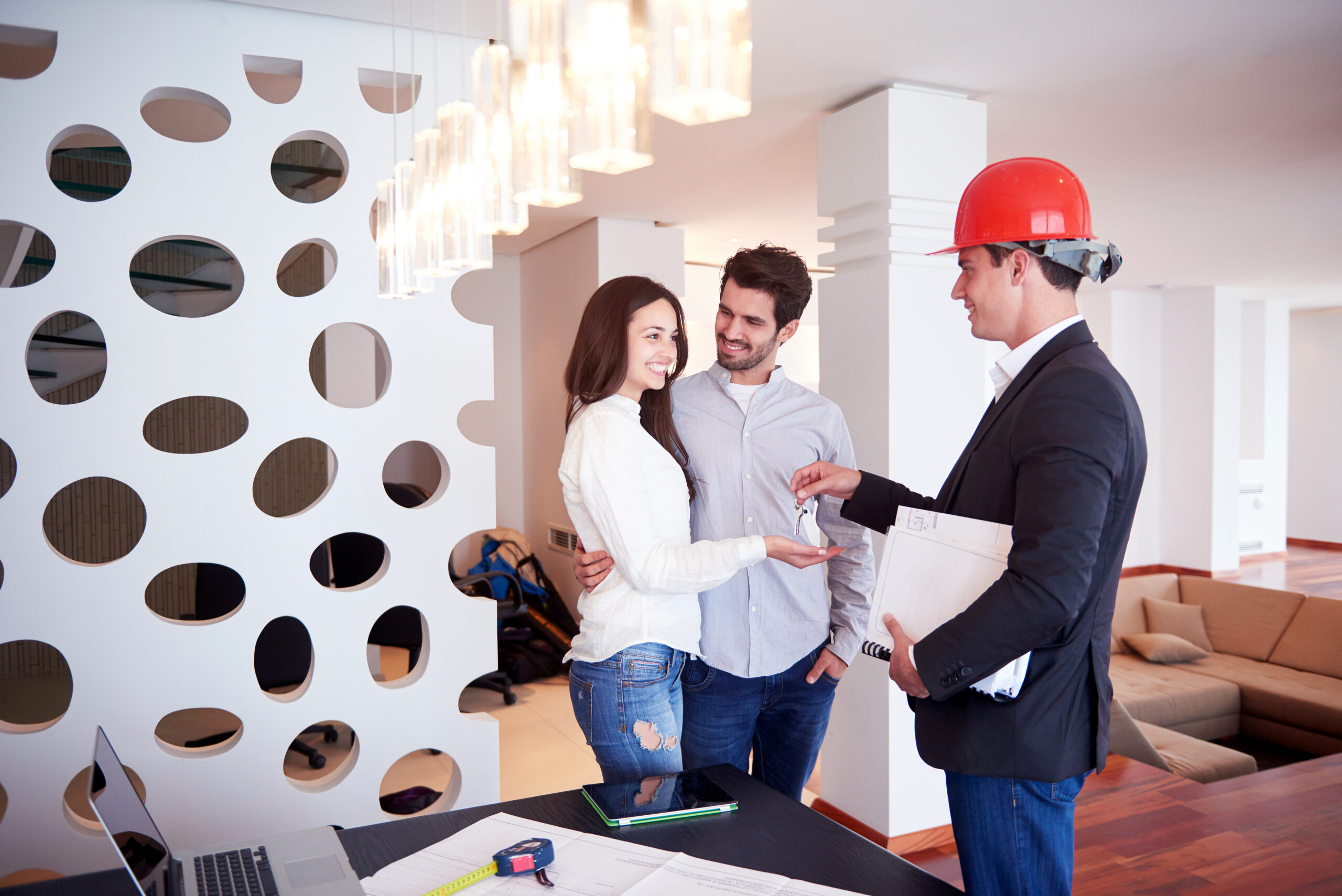 couple buying new home with real estate agent